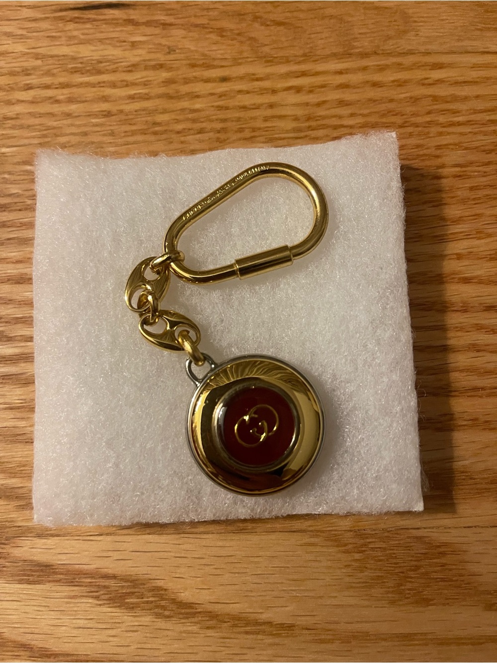 Gucci Gold-tone Bag Charm/Keychain with Red Enamel Accent